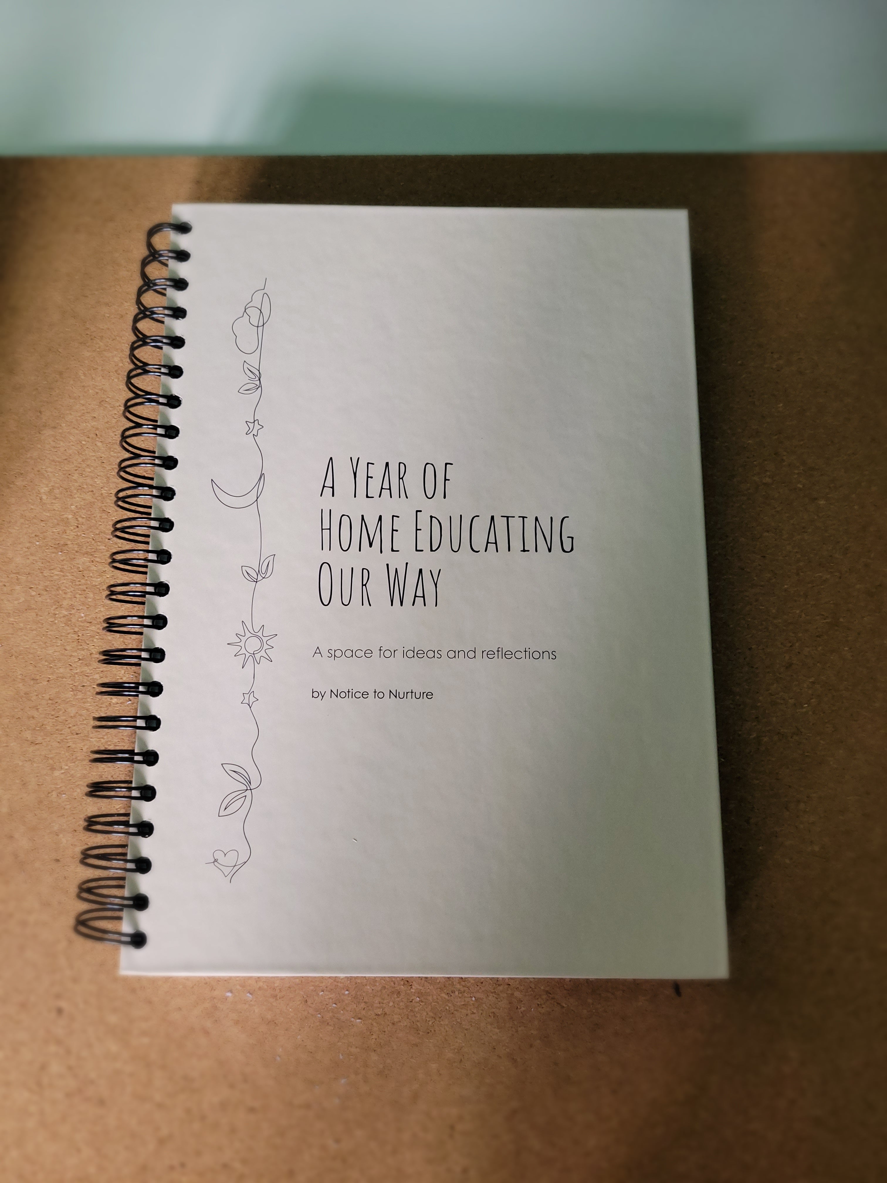 Notebook with text on a brown surface