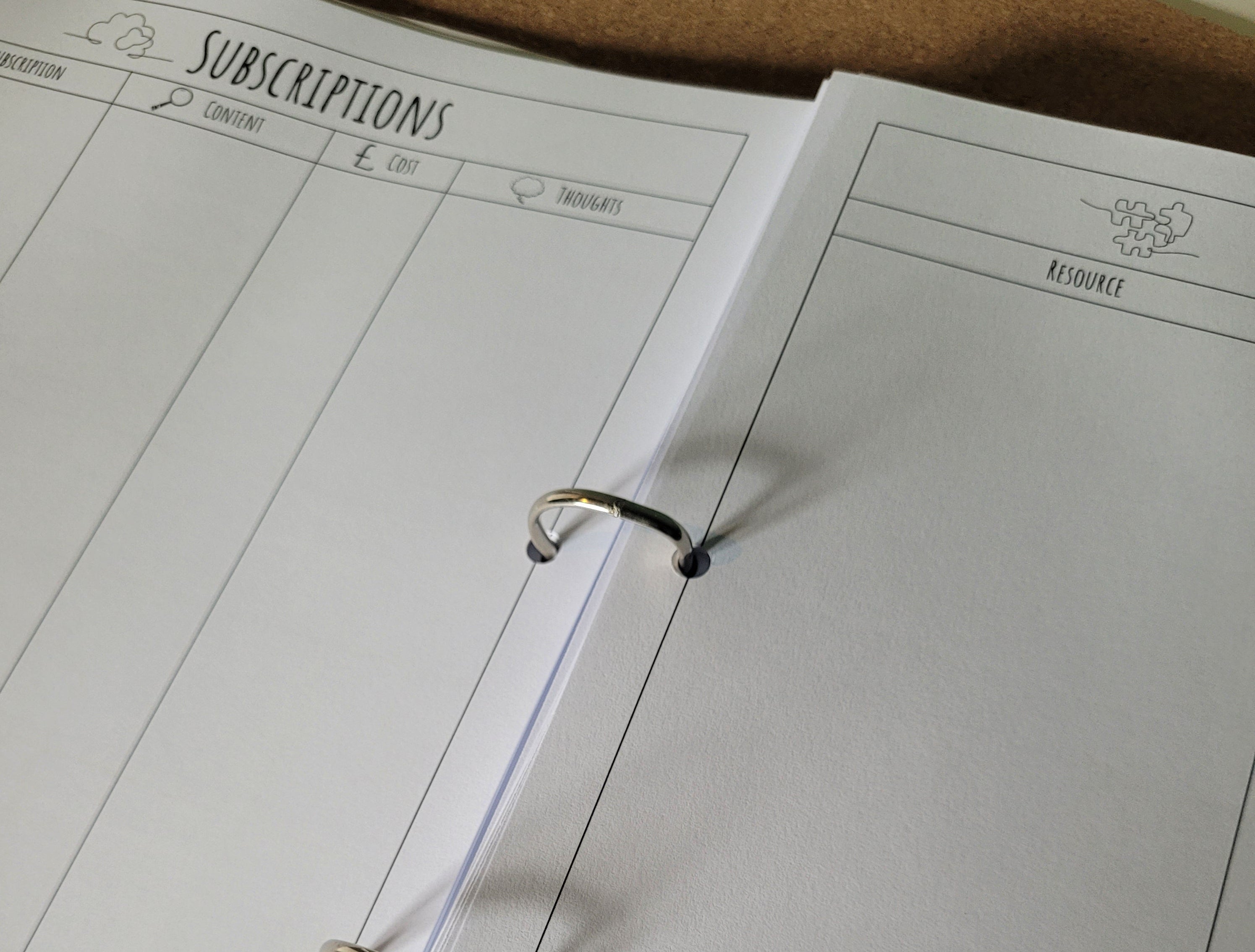 Open ring binder on a cork surface
